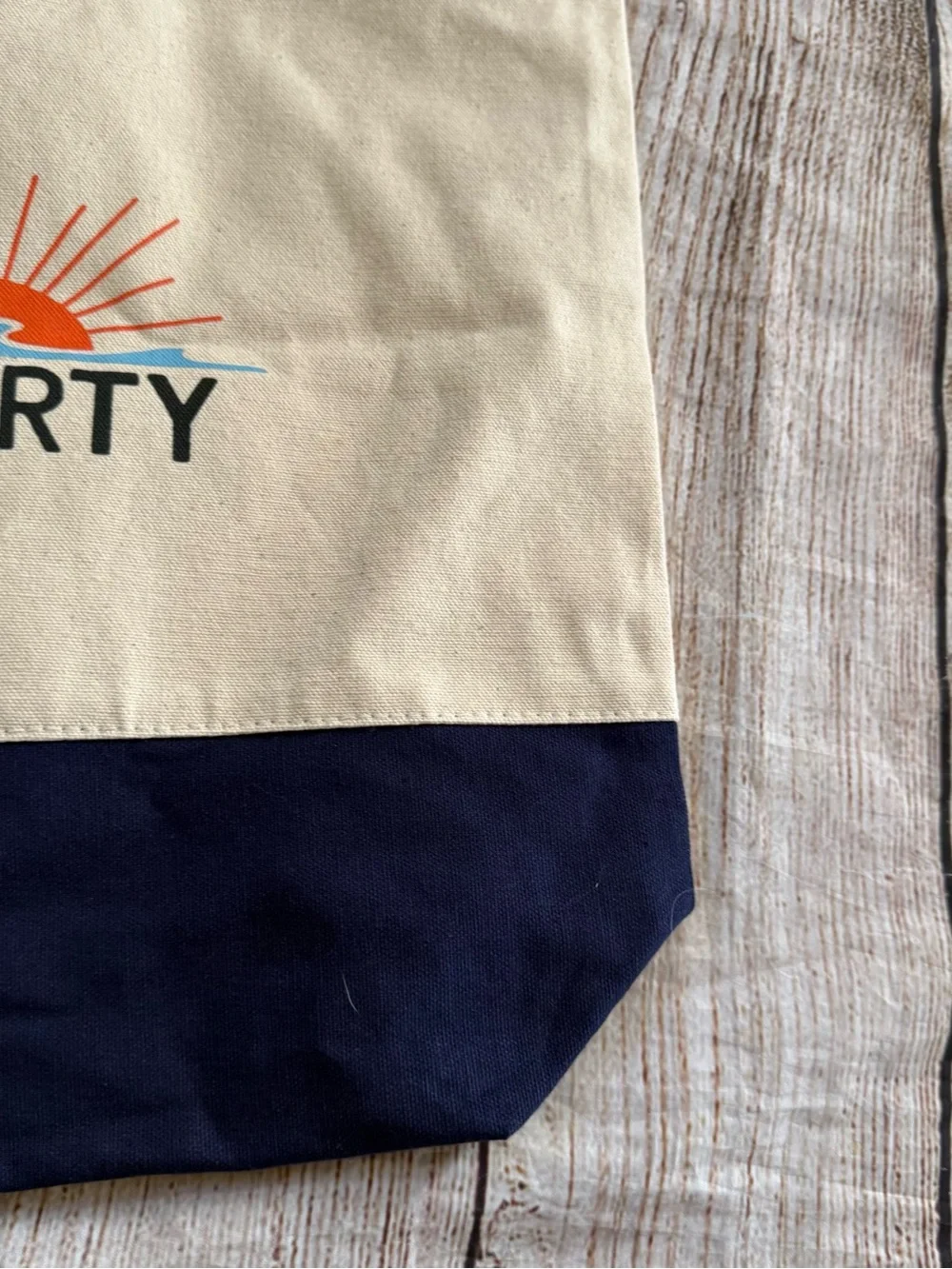 Faherty canvas reusable tote beige navy logo graphic 15.5 in x 14.5 in